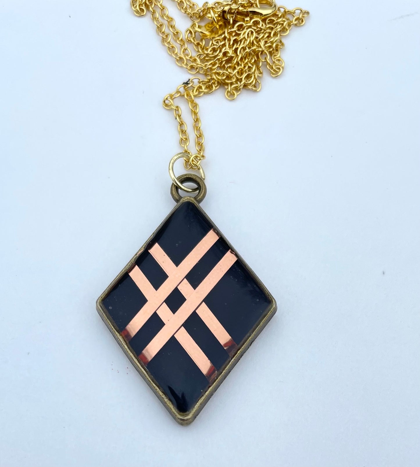 Gold and Black Pendant and Necklace